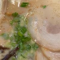 Tonkotsu White Straight Noodle · Pork chashu, egg, green onion, kikurage mushroom, bamboo. Add toppings for an additional cha...