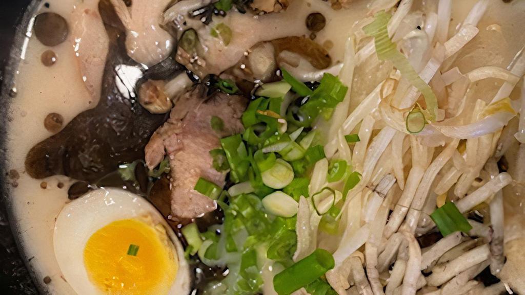 T Black Straight Noodle · Black garlic oil, pork chashu, egg, green onion, bean sprouts. Add toppings for an additional charge.