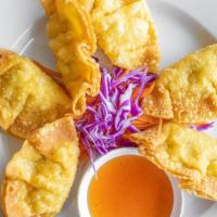 Golden Flower · Crispy wonton. Fried a crispy golden pastry cups stuffed with ground chicken and served with...