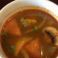 Tom Yum Soup · Lemongrass soup. Hot and sour soup with tomatoes, onion, lemongrass, kaffir lime leaves and ...