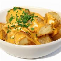 Patatas Bravas  · Fried potatoes with spicy mayo and aioli