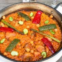 Paella Valenciana · Classic paella with chicken and vegetables