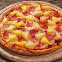 The Classic Hawaiian Pizza · Delicious pizza made with slices of ham and fresh pineapple chunks.
