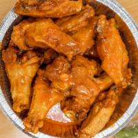 Buffalo Wing Platter · 10 pieces. Served with French fries, coleslaw and garlic bread, with bleu cheese, celery and...