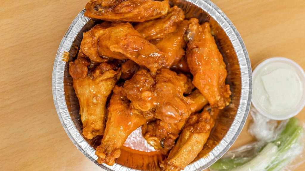 Buffalo Wing Platter · 10 pieces. Served with French fries, coleslaw and garlic bread, with bleu cheese, celery and choice of sauce.
