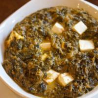 Saag Paneer · Fresh spinach cooked with cubes of cottage cheese.