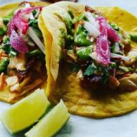 Fish Tacos (2 Per Order) · corn tortillas, cole slaw, radish, chipotle mayo, onions, cilantro, salsa verde.