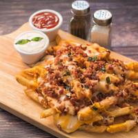 Mega Fries · Topped with cheese whiz,  mozzarella cheese & crispy bacon. Served with ranch dipping sauce.