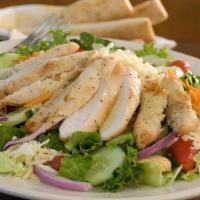 Grilled Chicken Salad · Marinated and char-grilled chicken over our garden salad.