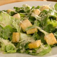 Caesar Salad · Romaine, Parmesan, and homemade croutons topped with Caesar dressing.