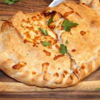 Cheese Calzone · Ricotta and mozzarella cheese. Served with pizza sauce on the side.