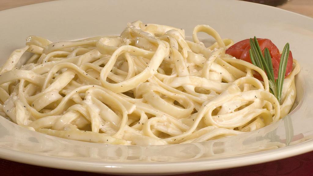 Fettuccini Alfredo (Full Portion) · Our creamy, delicious alfredo sauce over a hearty portion of fettuccini pasta. Hearty portions of pasta! Served with side garlic knots.