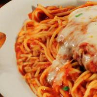 Chicken Parmigiana · Breaded chicken topped with provolone and marinara over spaghetti.