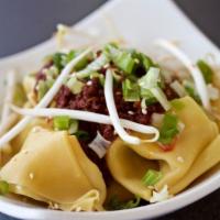 Szechuan Spicy Wontons (8 Pieces) · Spicy. Hand-made wontons covered in spicy sauce.