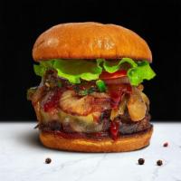 Bbq On Cue Burger · Homemade beef patty topped with melted cheese, barbecue sauce, lettuce, tomato, onion, and p...