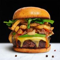 The Long Frieday Burger · Homemade beef patty topped with fries, avocado, caramelized onions, ketchup, lettuce, tomato...