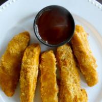 Fried Chick'N Tenders · Available in 3 count or 5 count with your choice of dipping sauce.