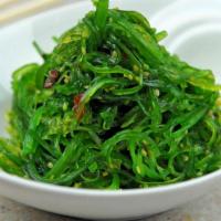 Seaweed Salad · Seasoned seaweed on bed of mixed green salad.