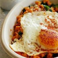 Sunny Chorizo Bowl · Two Cage-free sunny egg, chorizo, spinach, tomato, pepper and sweet potato hash, feta, scall...