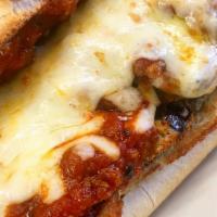 Eggplant Parm - Large · Breaded eggplant (contains parm) marinara, cheese.