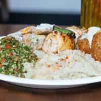 Mix Platter · Includes rice pilaf, choice of side dip, choice of salad, and pita bread.