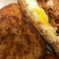 Breakfast Grilled Cheese · One Fried Egg with Bacon or Turkey Bacon, Sandwiched between Melted Cheese on Your Choice of...