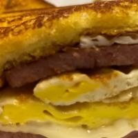 Ultimate French Toast Sandwich · Your Choice of Fried or Scrambled Eggs, with Your Choice of Breakfast Meat, and Cheese Sandw...