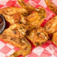 Whole Smoked Wings (4)  · Includes two side choices.