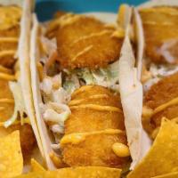 Fish Tacos · Soft tacos with coleslaw, chipotle aioli, and choice of beer-battered cod or fried shrimp.
