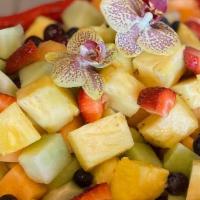 Fresh Fruit Bowl · Melons, Pineapple, Grapes, (Strawberries, Blueberries when available)