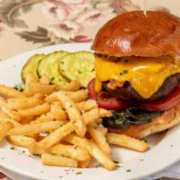 Beef Burger · Lean ground sirloin grilled to your liking, caramelized onions, bacon, lettuce, tomato, choi...