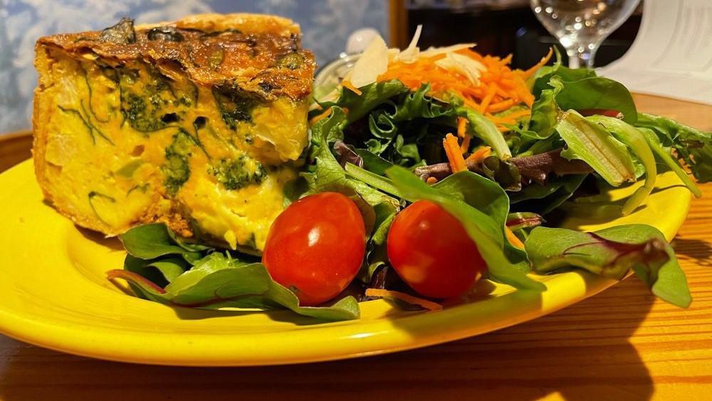 Quiche Du Jour · Baked daily stuffed with chef's inspiration, served with a side salad