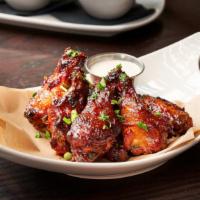 Mija Wings · Served with housemade bleu cheese dressing.