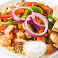 Meat Lovers Fajita · With Lettuce. Tomato, Green Pepper, Red Onions, White Sauce, 2 Tortillas, Basmati Rice, Ribe...