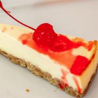 Strawberry Cheese Cake · A delicious slice of new york style cheesecake topped with strawberry flavor.