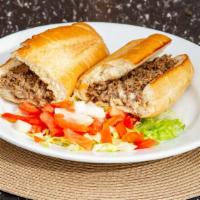 Steak Sliders · Seasoned choice cut seared steak served on our fresh baked rolls with caramelized onions, sh...