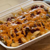 Spicy Loaded Fries · French fries topped with jalapeño, chipotle aioli, beef bacon and Cheese.