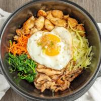 Ok-Dol Bibimbap · Korean marinated veggies on a bed of steamed rice w/ your choice of protein and served with ...