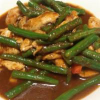 Pad Prik Khing · Medium spicy. With string beans and bell pepper in special red curry paste.
