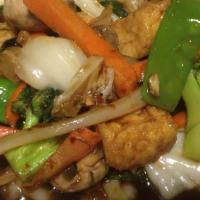 Ka Pow Jae · Medium spicy. Sauteed fresh basil leaves, onion, green pepper, mixed vegetables, mushrooms, ...