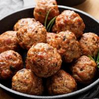 Polpette / Meatballs · Made from 100% prime beef, served with marinara, parmesan cheese, and parsley.