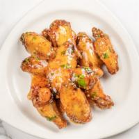 Chicken Wings · Buffalo, garlic parm or sweet chili.