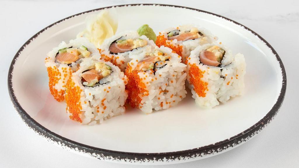 Spicy Salmon Maki · Salmon with cucumber, tobiko, and spicy mayo.