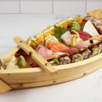 Rock The Boat For Two · Chef's choice of 6 pieces of assorted sushi, 10 pieces of sashimi, 6 pieces of spicy salmon ...