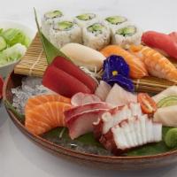Sushi Sashimi Combo Deluxe · Chef's choice of assorted 5 pieces of sushi, 12 pieces of sashimi and 6 pieces of California...