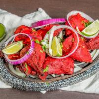 Tandoori Chicken Full · Marinated in distinctive herbs & spices and slowly cooked.