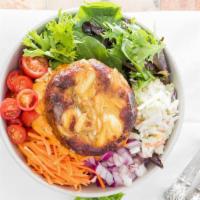 # Crab Cake Bowl · 8 Oz.  Jumbo Lump crab cake, rice, greens, onion, Cole slaw, Ranch.
