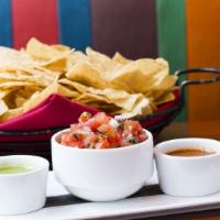 Chips & Salsa · Tomatoes, red onions, jalapenos, and lime.