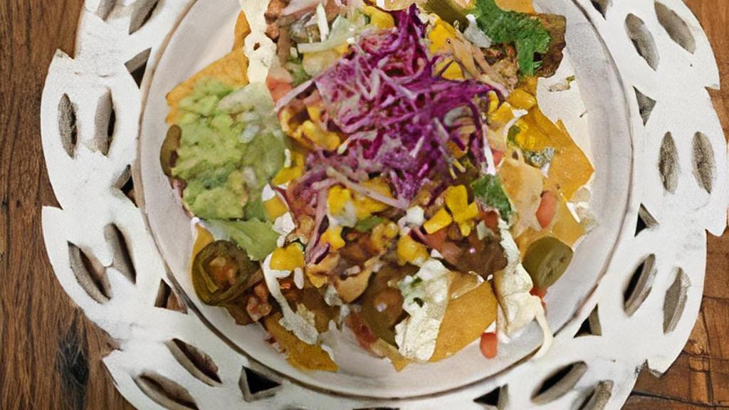 Super Nachos ( Meat Choice + Toppings Of Your Choice) · Corn Tortilla chips, with queso +  protein of your choice +any of your favorite toppings