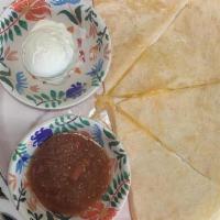 Cheese Only Quesadilla · 12-inch flour tortilla with Mexican cheese.. Served with sour cream and salsa.